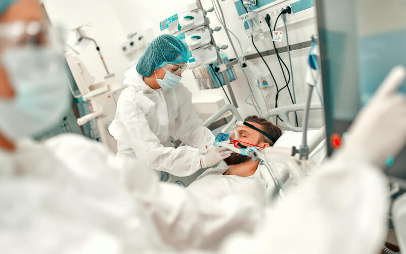 Man in Hospital Bed Man in Hospital Bed